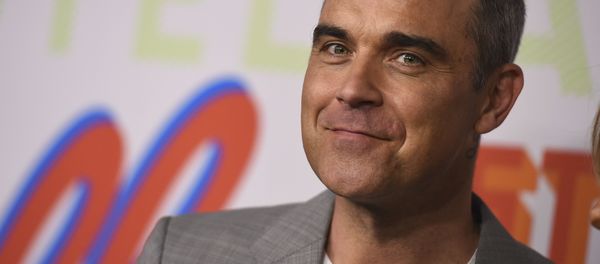 Robbie Williams arrives at the Stella McCartney Autumn 2018 Presentation on Tuesday, Jan. 16, 2018 in Los Angeles Robbie Williams arrives at the Stella McCartney Autumn 2018 Presentation on Tuesday, Jan. 16, 2018 in Los Angeles - Sputnik International