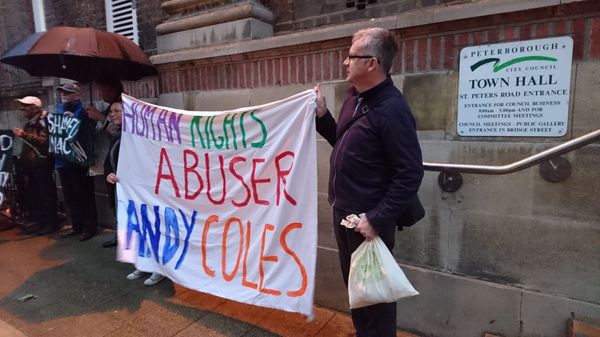 Protest at Peterborough Town Hall against Andy Coles, banner made by Jessica ©  Sack Andy Coles 2017 - Sputnik International