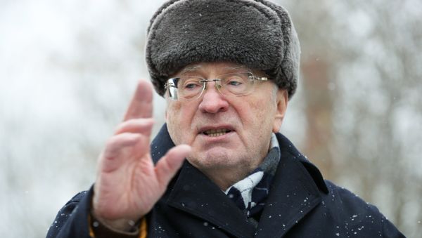 Leader of the Liberal Democratic Party of Russia Vladimir Zhirinovsky, center, visits The Red Pine dog shelter in Moscow Leader of the Liberal Democratic Party of Russia Vladimir Zhirinovsky, center, visits The Red Pine dog shelter in Moscow - Sputnik International