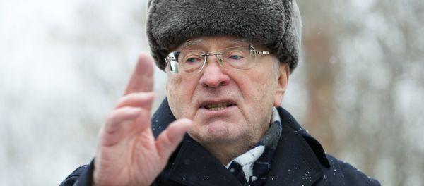 Leader of the Liberal Democratic Party of Russia Vladimir Zhirinovsky, center, visits The Red Pine dog shelter in Moscow Leader of the Liberal Democratic Party of Russia Vladimir Zhirinovsky, center, visits The Red Pine dog shelter in Moscow - Sputnik International