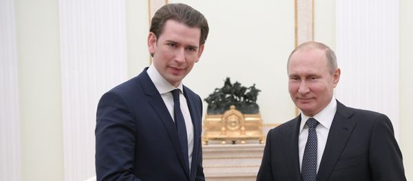 Russian President Vladimir Putin and Chancellor of Austria Sebastian Kurz, left, during a meeting - Sputnik International
