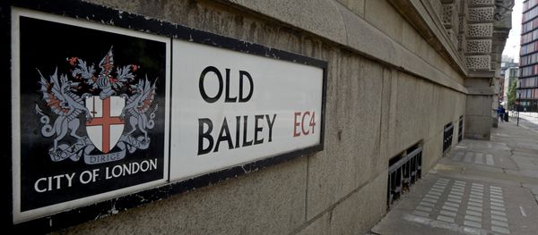 The coat of arms of the City of London (L) is pictured on the street sign for Old Bailey, where the Central Criminal Court, commonly referred to as The Old Bailey is situated in central London. (File) - Sputnik International