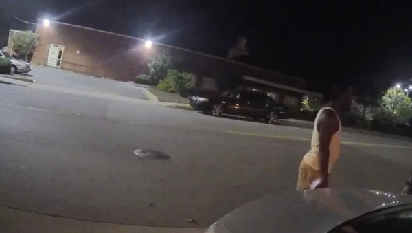 Bodycam footage shows North Carolina cop beat man for jaywalking Bodycam footage shows North Carolina cop beat man for jaywalking - Sputnik International