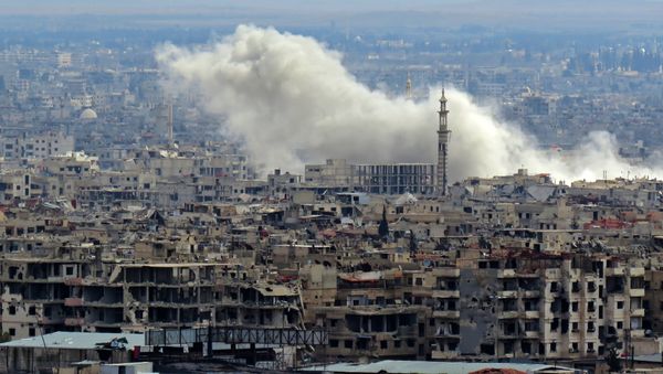 A general view taken from a government-held area in Damascus shows smoke rising from the rebel-held enclave of Eastern Ghouta on the outskirts of the Syrian capital following fresh air strikes and rocket fire on February 27, 2018 - Sputnik International