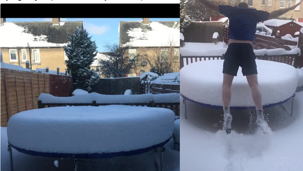 Brrrave: Bold Man Belly-Flops on Snowy Trampoline - Sputnik International
