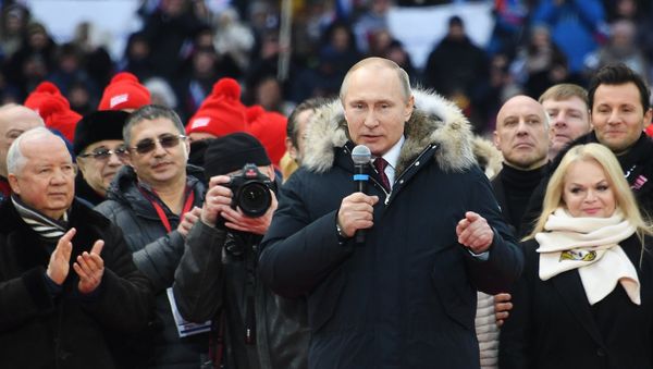 Russian President Putin delivers a speech during a rally to support his bid in the upcoming presidential election at Luzhniki Stadium in Moscow Russian President Putin delivers a speech during a rally to support his bid in the upcoming presidential election at Luzhniki Stadium in Moscow - Sputnik International
