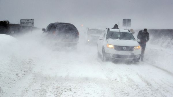 Cars in snowy conditions on the A192 road near Blyth, north east England, Thursday March 1, 2018 - Sputnik International