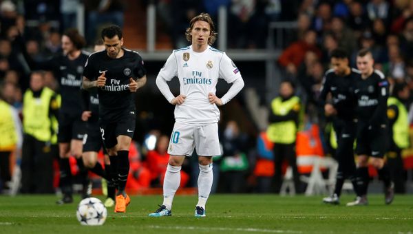 Luka Modric looks dejected as Paris St Germain players celebrate a goal but he could face jail in his native Croatia - Sputnik International