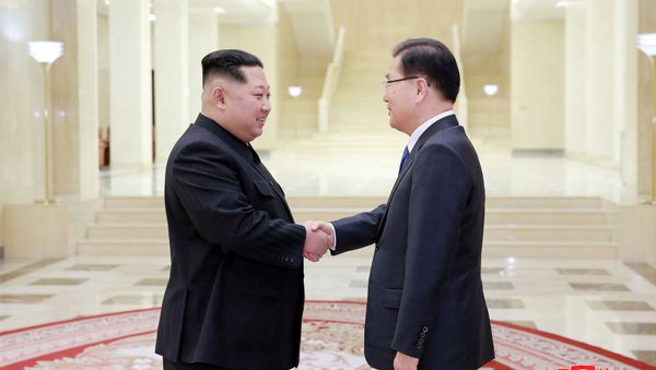 REFILE - ADDING NAME North Korean leader Kim Jong Un shakes hands with Chung Eui-yong who is leading a special delegation of South Korea's President, in this photo released by North Korea's Korean Central News Agency (KCNA) on March 6, 2018 REFILE - ADDING NAME North Korean leader Kim Jong Un shakes hands with Chung Eui-yong who is leading a special delegation of South Korea's President, in this photo released by North Korea's Korean Central News Agency (KCNA) on March 6, 2018 - Sputnik International