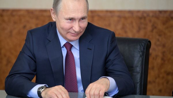 March 7, 2018. President Vladimir Putin at a meeting with female entrepreneurs from Russian regions at the Samara Bread and Confectionary Company ahead of International Women's Day - Sputnik International