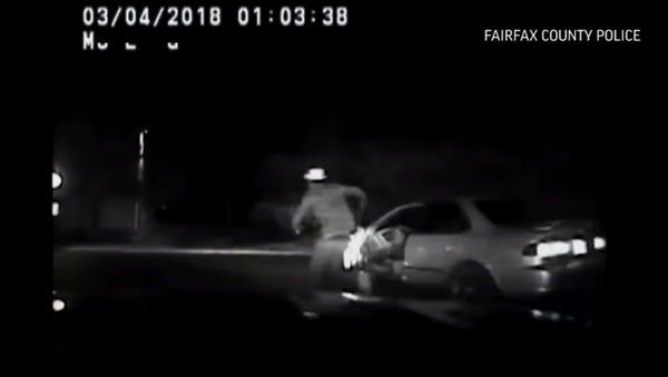 Virginia man running away from cops gets run over by own car - Sputnik International