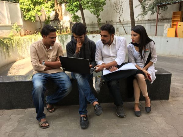 Priyanka and her cousin Vivek (extreme right) with their fellow community youths planning for their ‘Stop The V Ritual’ campaign - Sputnik International