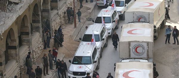 Trucks from Syrian Red Crescent and humanitarian partners are seen in Ghouta, Syria, March 5, 2018 in this picture obtained from social media Trucks from Syrian Red Crescent and humanitarian partners are seen in Ghouta, Syria, March 5, 2018 in this picture obtained from social media - Sputnik International