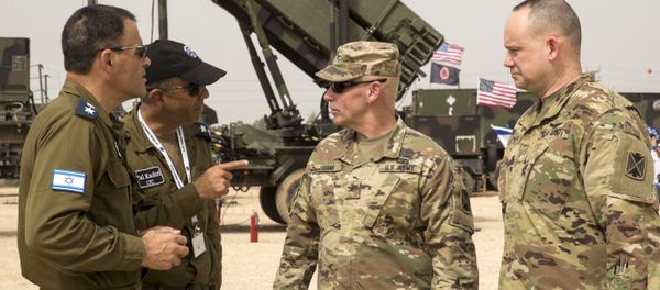 US and Israeli army officers talk in front a US Patriot missile defence system during the Israeli-US military exercise Juniper Cobra at the Hatzor Airforce Base in Israel on March 8, 2018 US and Israeli army officers talk in front a US Patriot missile defence system during the Israeli-US military exercise Juniper Cobra at the Hatzor Airforce Base in Israel on March 8, 2018 - Sputnik International