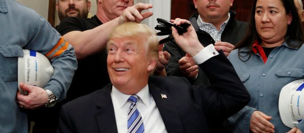 U.S. President Donald Trump gives out pens he used to sign presidential proclamations placing tariffs on steel and aluminum imports to workers from the steel and aluminum industries at the White House in Washington, U.S. March 8, 2018 U.S. President Donald Trump gives out pens he used to sign presidential proclamations placing tariffs on steel and aluminum imports to workers from the steel and aluminum industries at the White House in Washington, U.S. March 8, 2018 - Sputnik International