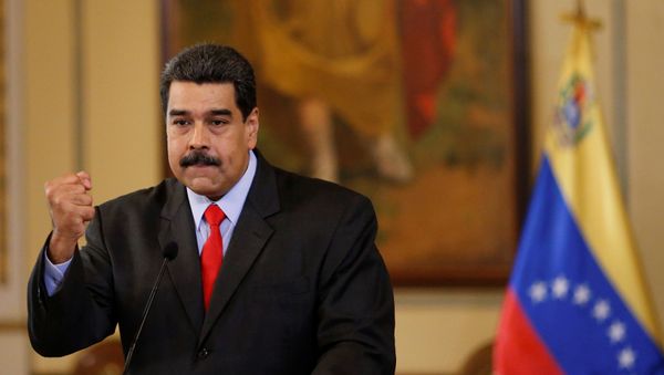 Venezuela's President Nicolas Maduro gestures as he talks to the media during a news conference in Caracas, Venezuela February 15, 2018 - Sputnik International