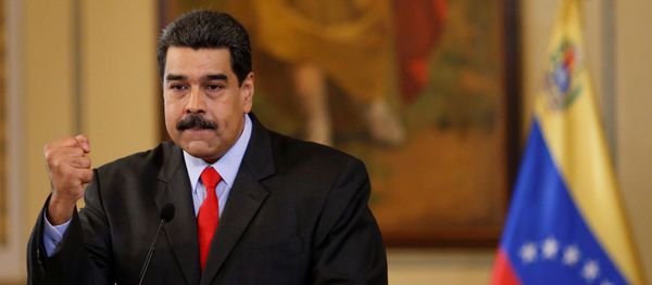 Venezuela's President Nicolas Maduro gestures as he talks to the media during a news conference in Caracas, Venezuela February 15, 2018 - Sputnik International