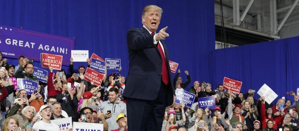U.S. President Donald Trump points at supporters after speaking in support of Republican congressional candidate Rick Sacconne during a Make America Great Again rally in Moon Township, Pennsylvania, U.S., March 10, 2018 - Sputnik International