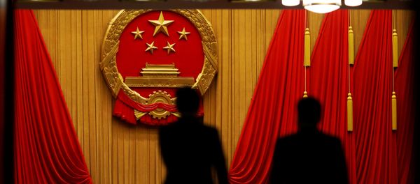 Delegates arrive to the third plenary session of the National People's Congress (NPC) at the Great Hall of the People to take a part in a vote on a constitutional amendment lifting presidential term limits, in Beijing, China March 11, 2018 Delegates arrive to the third plenary session of the National People's Congress (NPC) at the Great Hall of the People to take a part in a vote on a constitutional amendment lifting presidential term limits, in Beijing, China March 11, 2018 - Sputnik International
