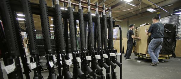 In this April 10, 2013 file photo, newly made AR-15 rifles stand in a rack at Stag Arms in New Britain, Conn. In this April 10, 2013 file photo, newly made AR-15 rifles stand in a rack at Stag Arms in New Britain, Conn. - Sputnik International