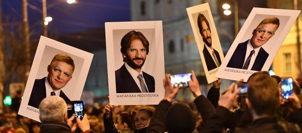Protesters holds placards bearing faceted portraits of Slovakia's Prime Minister Robert Foco and Foreign Minister Robert Kalinak during a rally under the slogan For a Decent Slovakia, against corruption and to pay tribute to murdered Slovak journalist Jan Kuciak and his fiancee Martina Kusnirova on March 9, 2018 at the Slovak National Uprising (SNP) square in Bratislava, Slovakia Protesters holds placards bearing faceted portraits of Slovakia's Prime Minister Robert Foco and Foreign Minister Robert Kalinak during a rally under the slogan For a Decent Slovakia, against corruption and to pay tribute to murdered Slovak journalist Jan Kuciak and his fiancee Martina Kusnirova on March 9, 2018 at the Slovak National Uprising (SNP) square in Bratislava, Slovakia - Sputnik International