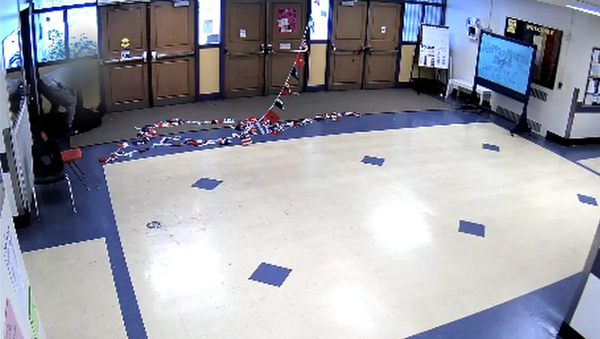 Security guard stationed at Washington Middle School in Washington State gets caught slamming student to the ground on surveillance camera. - Sputnik International