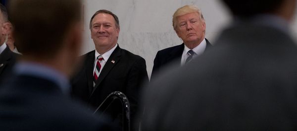 President Donald Trump, accompanied by CIA Director-designate Rep. Michael Pompeo, left, waits to speak at the Central Intelligence Agency in Langley, Va., Saturday, Jan. 21, 2017 President Donald Trump, accompanied by CIA Director-designate Rep. Michael Pompeo, left, waits to speak at the Central Intelligence Agency in Langley, Va., Saturday, Jan. 21, 2017 - Sputnik International