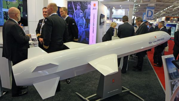 Visitors are gathered next to a display of an anti-ship missile made by Norwegian company Kongsberg (File) - Sputnik International