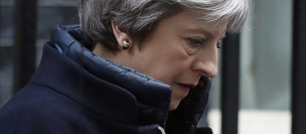 Britain's Prime Minister Theresa May leaves 10 Downing Street to attend the weekly Prime Minister's Questions session, in parliament in London, Wednesday, March 14, 2018 Britain's Prime Minister Theresa May leaves 10 Downing Street to attend the weekly Prime Minister's Questions session, in parliament in London, Wednesday, March 14, 2018 - Sputnik International