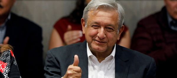 FILE PHOTO: Andres Manuel Lopez Obrador, presidential candidate of the National Regeneration Movement (MORENA) gives a thumbs up to members of Partido del Trabajo (Labor Party), in Mexico City, Mexico February 19, 2018 - Sputnik International