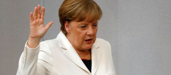 German Chancellor Angela Merkel is sworn-in by Parliament President Wolfgang Schaeuble (not pictured) during a meeting of Germany's lower house of parliament Bundestag in Berlin, Germany, March 14, 2018 - Sputnik International