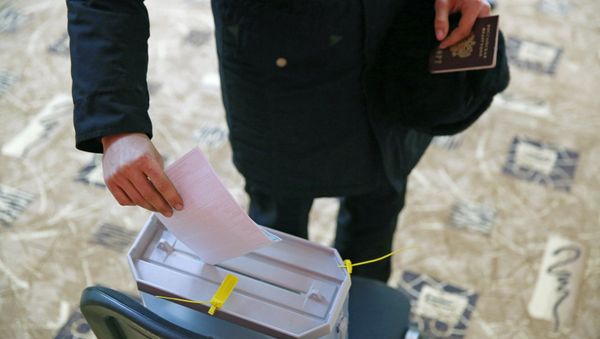 A Russian Navy sailor during the early voting for the 2018 Russian presidential election at polling station (File) - Sputnik International