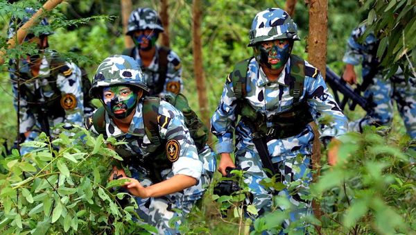 Chinese People's Liberation Army (PLA) women marines during a military exercise, somewhere on the south China coast (File) Chinese People's Liberation Army (PLA) women marines during a military exercise, somewhere on the south China coast (File) - Sputnik International