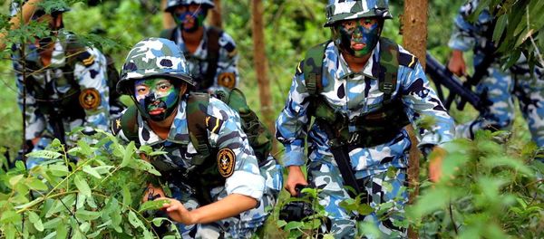 Chinese People's Liberation Army (PLA) women marines during a military exercise, somewhere on the south China coast (File) Chinese People's Liberation Army (PLA) women marines during a military exercise, somewhere on the south China coast (File) - Sputnik International