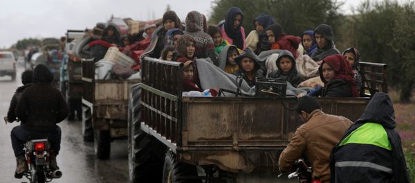 People sit in a truck with their belongings in the north east of Afrin, Syria March 15, 2018 People sit in a truck with their belongings in the north east of Afrin, Syria March 15, 2018 - Sputnik International