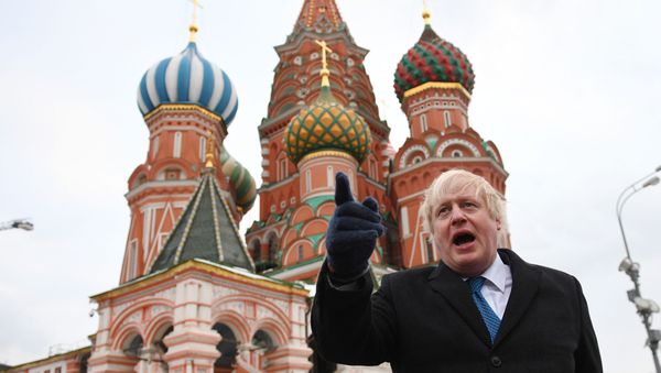 British Foreign Secretary Boris Johnson stands in front of Saint Basil's cathedral in Red square in Moscow on December 22, 2017 after a meeting with his Russian counterpart. British Foreign Secretary Boris Johnson stands in front of Saint Basil's cathedral in Red square in Moscow on December 22, 2017 after a meeting with his Russian counterpart. - Sputnik International
