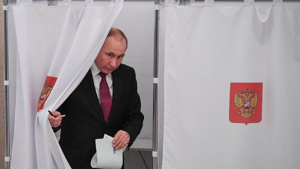 Russian President and Presidential candidate Vladimir Putin at a polling station during the presidential election in Moscow, Russia March 18, 2018 Russian President and Presidential candidate Vladimir Putin at a polling station during the presidential election in Moscow, Russia March 18, 2018 - Sputnik International