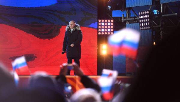 Russian President Vladimir Putin attends the concert and meeting celebrating the first anniversary of Crimea’s reunification with Russia, at Manezhnaya Square in Moscow - Sputnik International