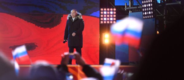 Russian President Vladimir Putin attends the concert and meeting celebrating the first anniversary of Crimea’s reunification with Russia, at Manezhnaya Square in Moscow Russian President Vladimir Putin attends the concert and meeting celebrating the first anniversary of Crimea’s reunification with Russia, at Manezhnaya Square in Moscow - Sputnik International