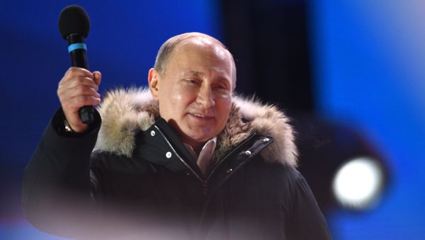 Russian President Vladimir Putin attends the concert and meeting celebrating the first anniversary of Crimea’s reunification with Russia, at Manezhnaya Square in Moscow - Sputnik International