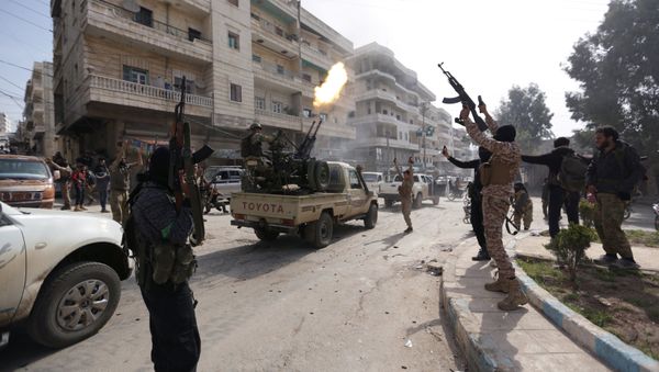 Turkish-backed Free Syrian Army members are celebrating in Afrin, Syria March 18, 2018 - Sputnik International