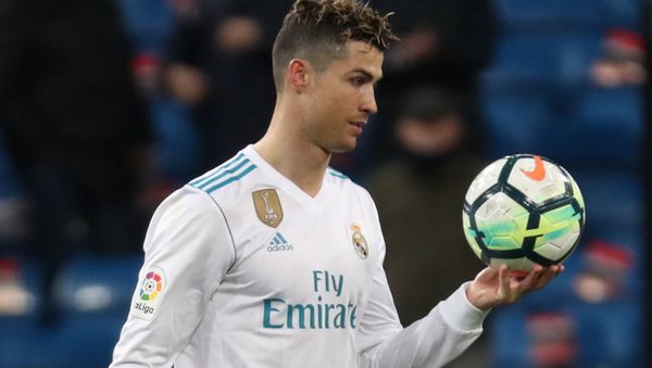 Soccer Football - La Liga Santander - Real Madrid vs Girona - Santiago Bernabeu, Madrid, Spain - March 18, 2018 Real Madrid's Cristiano Ronaldo with the matchball after the match - Sputnik International