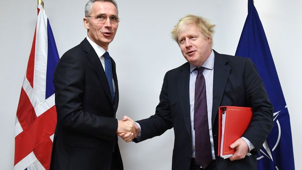 NATO Secretary-General Jens Stoltenberg poses with British Foreign Secretary Boris Johnson at the Alliance headquarters in Brussels, Belgium NATO Secretary-General Jens Stoltenberg poses with British Foreign Secretary Boris Johnson at the Alliance headquarters in Brussels, Belgium - Sputnik International