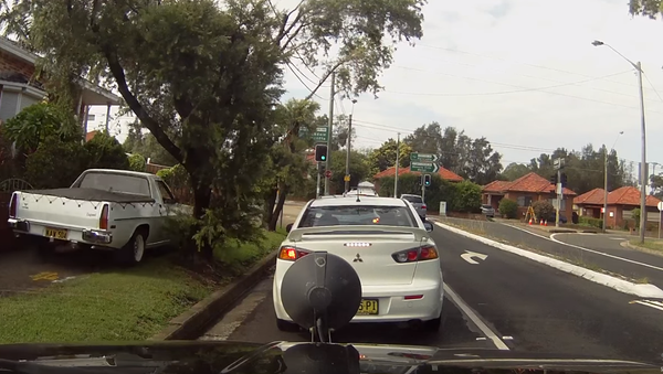 Sidewalk Less Traveled: Impatient Driver Creates Detour - Sputnik International