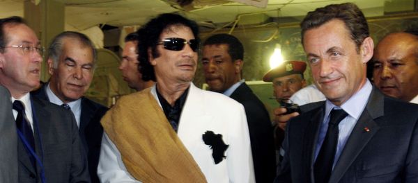 Libya's President Muammar Gaddafi (L) greets his counterpart from France Nicolas Sarkozy at Bab Azizia Palace in Tripoli July 25, 2007, the day after the release of six foreign medics from Libyan jails Libya's President Muammar Gaddafi (L) greets his counterpart from France Nicolas Sarkozy at Bab Azizia Palace in Tripoli July 25, 2007, the day after the release of six foreign medics from Libyan jails - Sputnik International