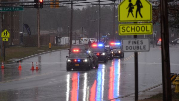 Law enforcement motorcade is seen near the Great Mills High School following a shooting on Tuesday morning in St. Mary's County, Maryland, U.S., March 20, 2018 - Sputnik International