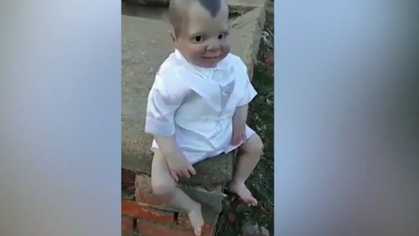 Creepy doll on mexican graveyard Creepy doll on mexican graveyard - Sputnik International