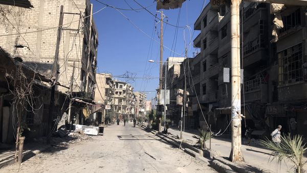 Syrian Army's armored vehicles in the liberated town of Kafr Batna in Eastern Ghouta Syrian Army's armored vehicles in the liberated town of Kafr Batna in Eastern Ghouta - Sputnik International