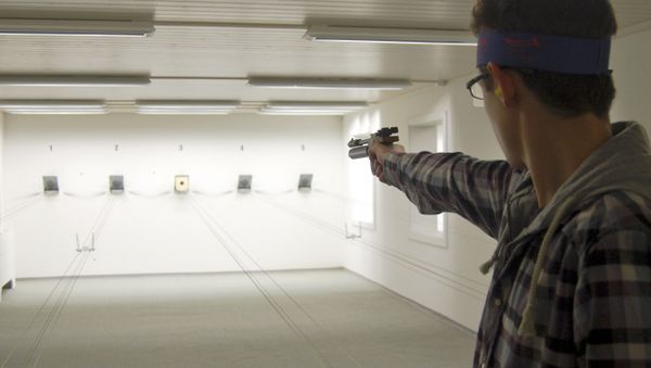 A man trains with a softair pistole on the shooting range of the village's shooting club in Bueren an der Aare near Bern, Switzerland. (File) - Sputnik International
