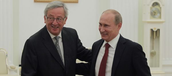 Russian President Vladimir Putin, right, and European Commission President Jean-Claude Juncker. File photo - Sputnik International